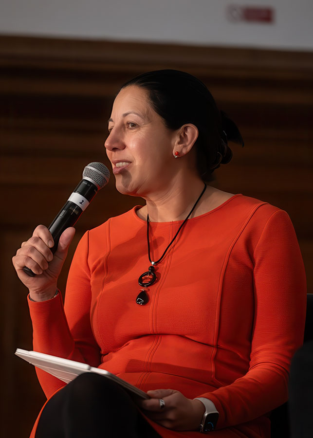 priya guha mbe speaking at conference